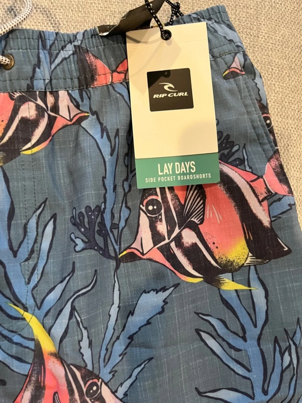 Quiksilver Men’s Blue Swim Trunks with Pink & Yellow Tropical Fish flow volley